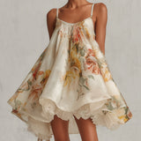 Abito mini A-line in organza floreale beige con bordino in pizzo
