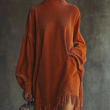 Abito arancione in corduroy con orlo a frange e colletto alto