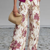 Set Gilet Rosa e Pantaloni Ampi a Fiori
