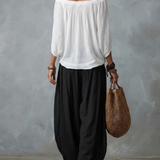 Set Top Bianco Off-Shoulder e Pantaloni Larghi